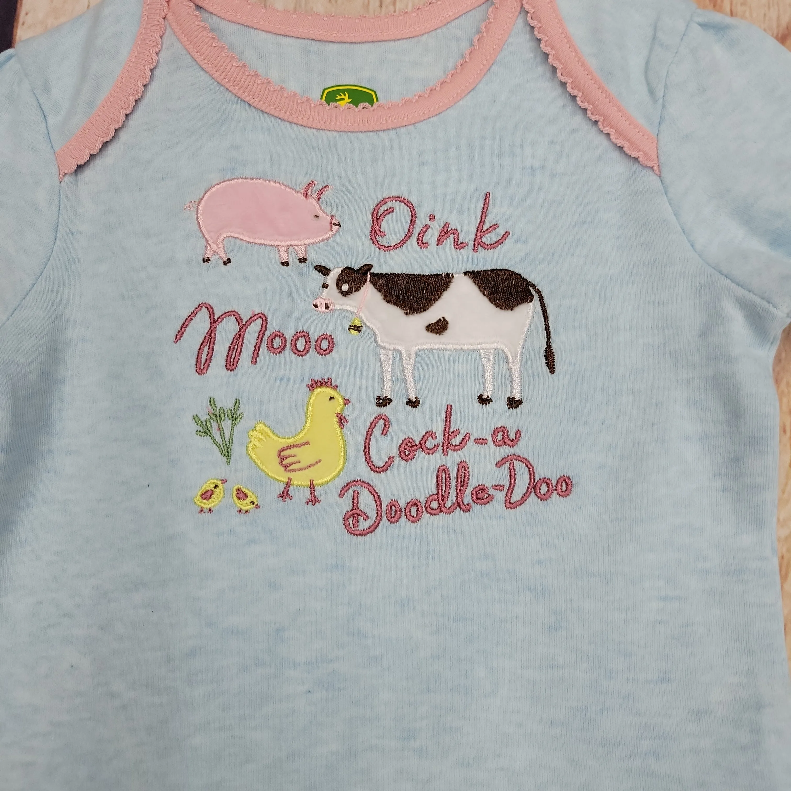 JOHN DEERE SKYT BLUE ONESIE W/PIGS AND COWS